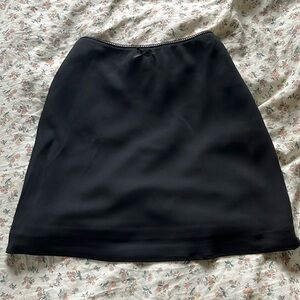 Black bow mini skirt